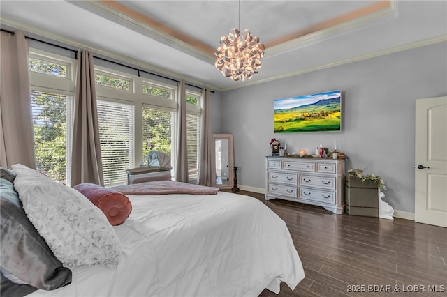 5938 N Chatham Ave, Kansas City, MO 64151 - bedroom featuring baseboards, a chandelier, a tray ceiling, ornamental molding, and dark wood-style flooring