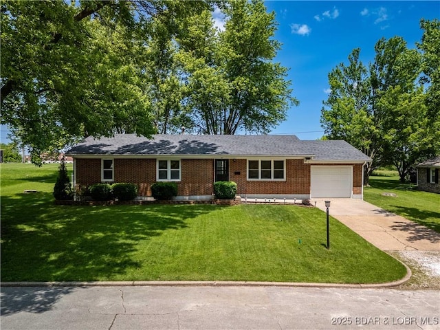 107 Haynes St, Eldon, MO 65026 - ranch-style home with an attached garage, brick siding, concrete driveway, and a front yard