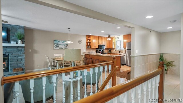 611 Lazy Days Rd Unit W1, Osage Beach, MO 65065 - corridor with light tile patterned floors, recessed lighting, and a sink