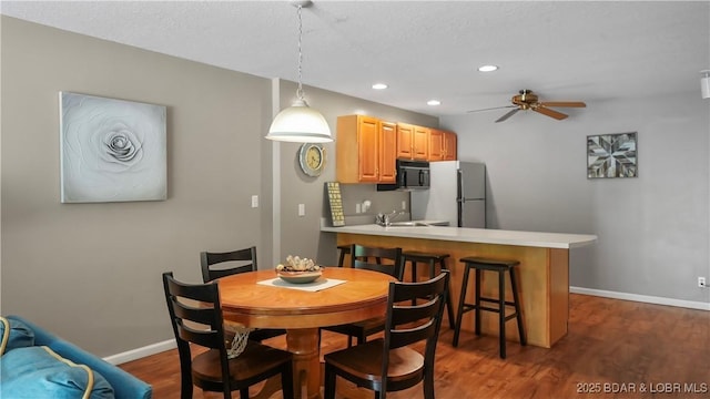 611 Lazy Days Rd Unit W1, Osage Beach, MO 65065 - dining space featuring ceiling fan, dark wood finished floors, baseboards, and recessed lighting