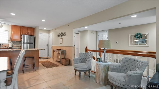 611 Lazy Days Rd Unit W1, Osage Beach, MO 65065 - living room with recessed lighting and light tile patterned floors