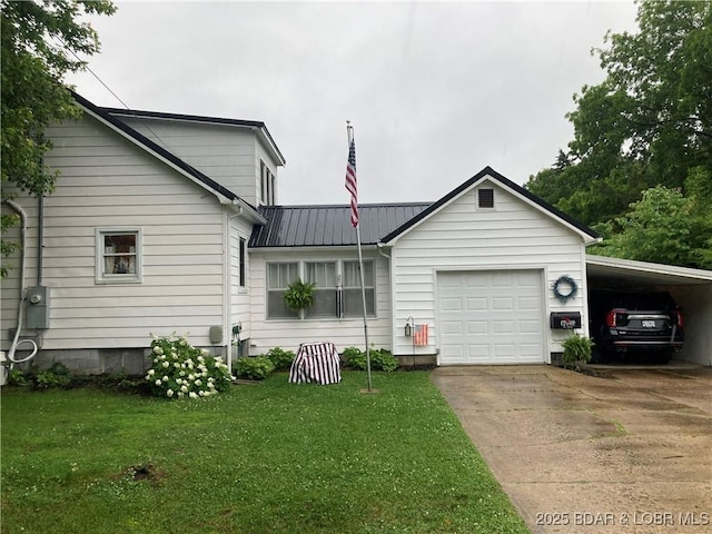 301 Burke St, Versailles, MO 65084 - view of front of property featuring driveway, a front yard, metal roof, a garage, and a carport