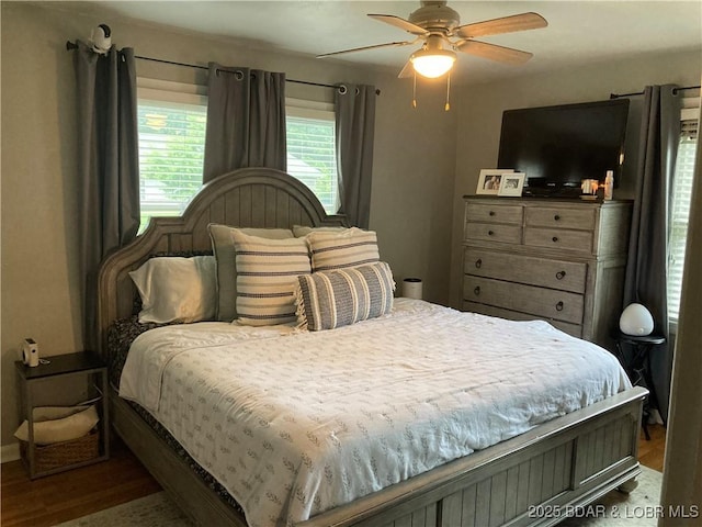301 Burke St, Versailles, MO 65084 - bedroom featuring wood finished floors and ceiling fan