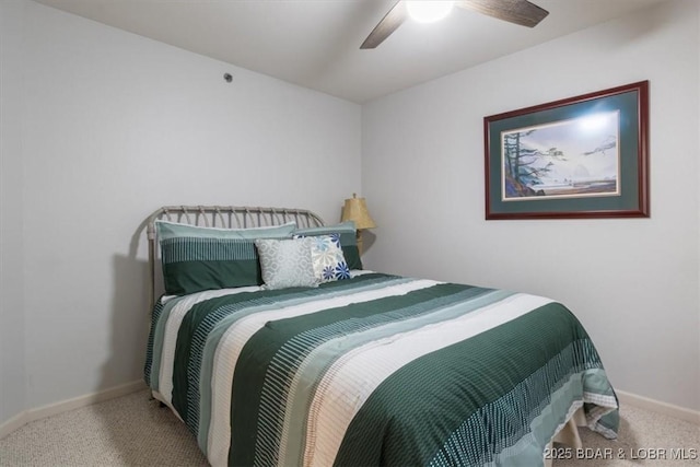 4800 Eagleview Dr Unit 115B, Osage Beach, MO 65065 - carpeted bedroom featuring baseboards and ceiling fan