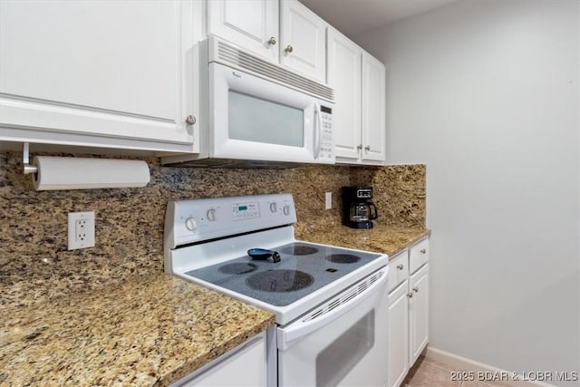 4800 Eagleview Dr Unit 115B, Osage Beach, MO 65065 - kitchen with white appliances, decorative backsplash, white cabinets, and light stone counters