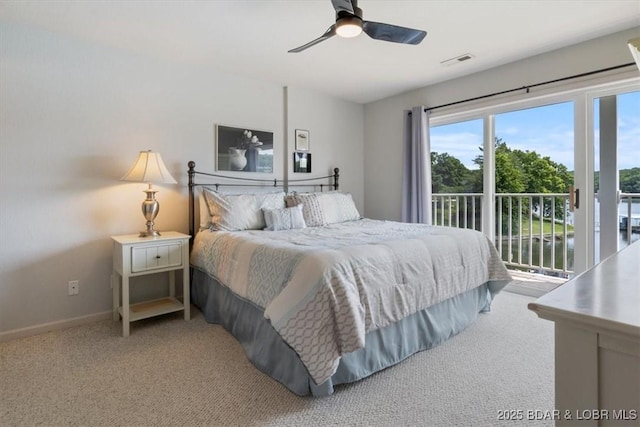 4800 Eagleview Dr Unit 115B, Osage Beach, MO 65065 - carpeted bedroom featuring access to outside, baseboards, and ceiling fan