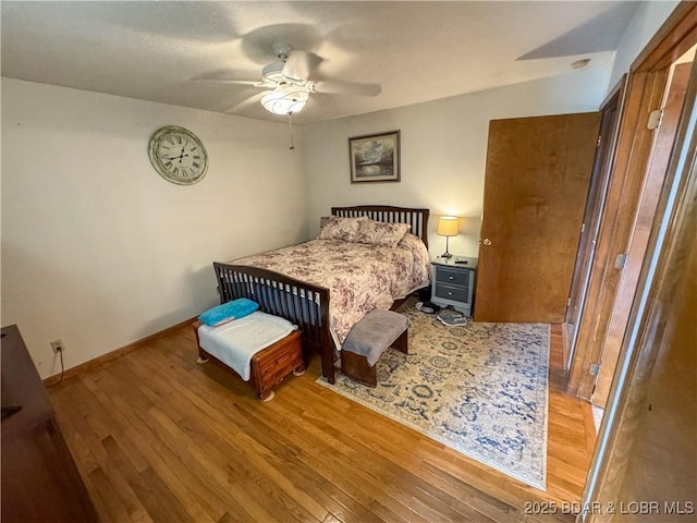 104 Tower View Dr, Versailles, MO 65084 - bedroom with light wood-style floors, baseboards, and ceiling fan
