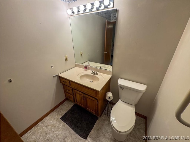 104 Tower View Dr, Versailles, MO 65084 - half bath featuring vanity, toilet, and baseboards