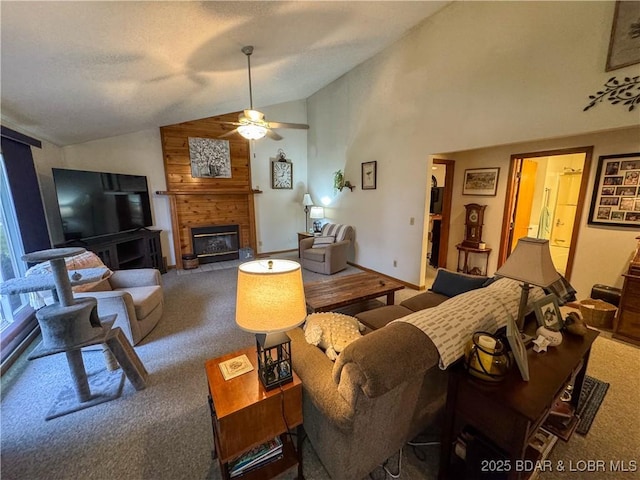 104 Tower View Dr, Versailles, MO 65084 - carpeted living area featuring lofted ceiling, a fireplace, a ceiling fan, and baseboards