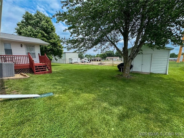 104 Tower View Dr, Versailles, MO 65084 - view of yard featuring central AC and a deck