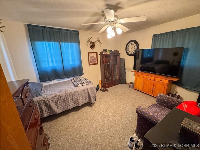 104 Tower View Dr, Versailles, MO 65084 - bedroom with light colored carpet, a textured ceiling, and a ceiling fan