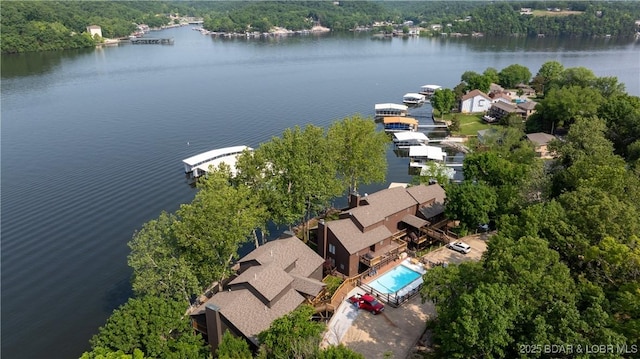 149 Sycamore Beach Rd Unit C1, Camdenton, MO 65020 - bird's eye view of a large body of water and a heavily wooded area