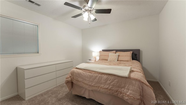 149 Sycamore Beach Rd Unit C1, Camdenton, MO 65020 - bedroom featuring carpet floors, a ceiling fan, and baseboards