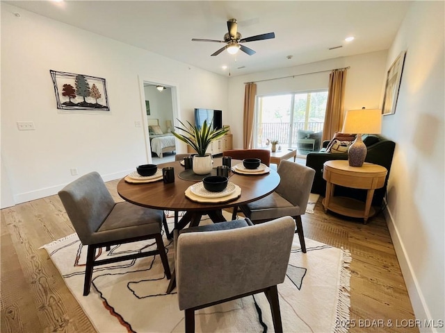 295 Highland Shores Dr Unit 2D, Lake Ozark, MO 65049 - dining room featuring light wood finished floors, a ceiling fan, baseboards, and recessed lighting