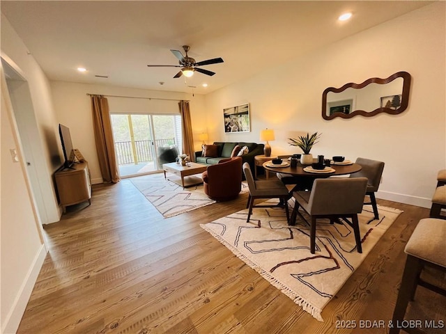 295 Highland Shores Dr Unit 2D, Lake Ozark, MO 65049 - living room with wood finished floors, ceiling fan, baseboards, and recessed lighting