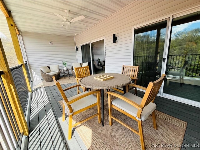 295 Highland Shores Dr Unit 2D, Lake Ozark, MO 65049 - sunroom / solarium featuring ceiling fan and outdoor dining space