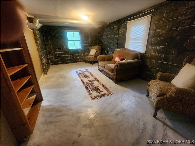 159 Tonka Shady Ln, Camdenton, MO 65020 - sitting room featuring unfinished concrete floors and concrete block wall