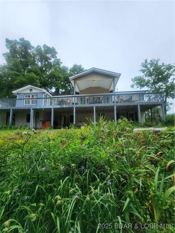159 Tonka Shady Ln, Camdenton, MO 65020 - rear view of house featuring a deck