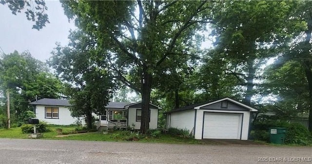 159 Tonka Shady Ln, Camdenton, MO 65020 - single story home with an outdoor structure and a detached garage