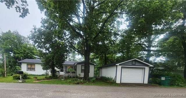 159 Tonka Shady Ln, Camdenton, MO 65020 - ranch-style house with an outdoor structure and a detached garage