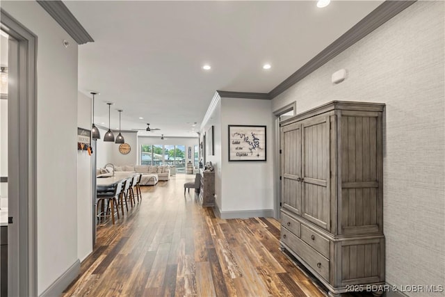 1184 Jeffries Rd Unit 312, Osage Beach, MO 65065 - hall with dark wood-style flooring, crown molding, recessed lighting, and baseboards