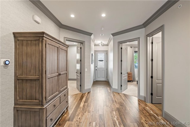1184 Jeffries Rd Unit 312, Osage Beach, MO 65065 - foyer with ornamental molding, light wood-style flooring, baseboards, and recessed lighting
