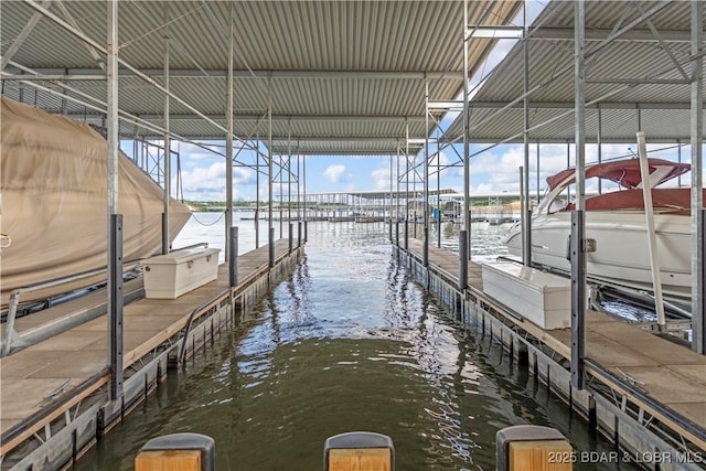 1184 Jeffries Rd Unit 312, Osage Beach, MO 65065 - dock with a water view and boat lift