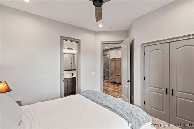 1184 Jeffries Rd Unit 312, Osage Beach, MO 65065 - bedroom featuring recessed lighting, a closet, ensuite bath, and ceiling fan