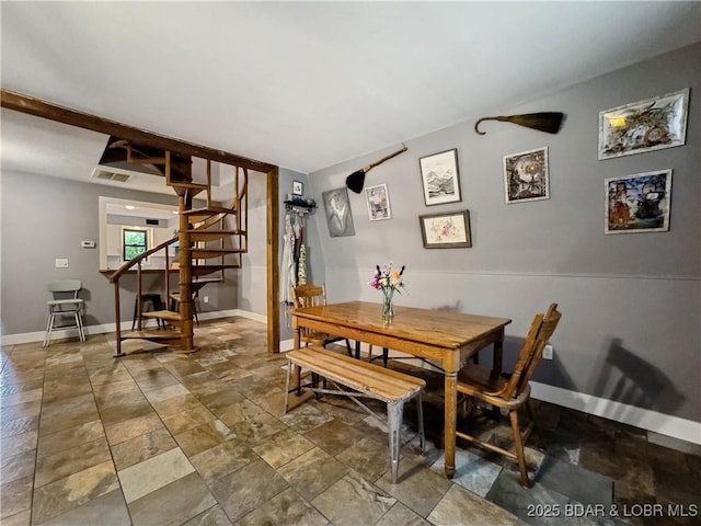 75 Central Hill Rd, Eldon, MO 65026 - dining space with stairway, baseboards, and stone finish flooring