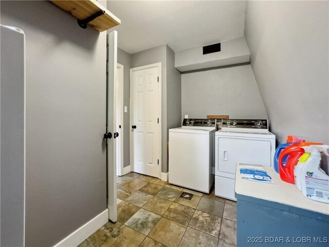 75 Central Hill Rd, Eldon, MO 65026 - laundry area with washing machine and clothes dryer and baseboards