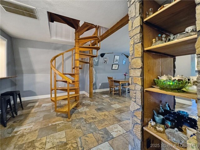 75 Central Hill Rd, Eldon, MO 65026 - interior space with stairs, baseboards, and stone finish flooring