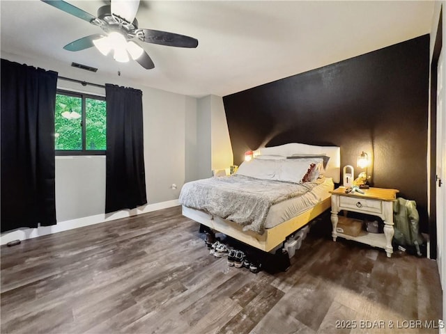 75 Central Hill Rd, Eldon, MO 65026 - bedroom featuring wood finished floors, baseboards, and a ceiling fan