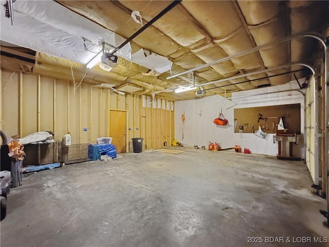 75 Central Hill Rd, Eldon, MO 65026 - garage featuring a garage door opener