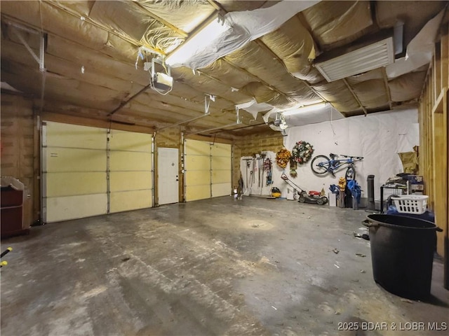 75 Central Hill Rd, Eldon, MO 65026 - garage with a garage door opener