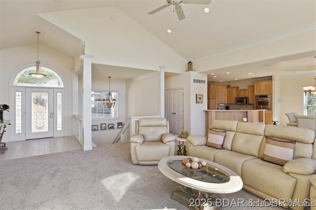 549 Cedar Rd, Lake Ozark, MO 65049 - living area with high vaulted ceiling, light colored carpet, a chandelier, ceiling fan, and recessed lighting