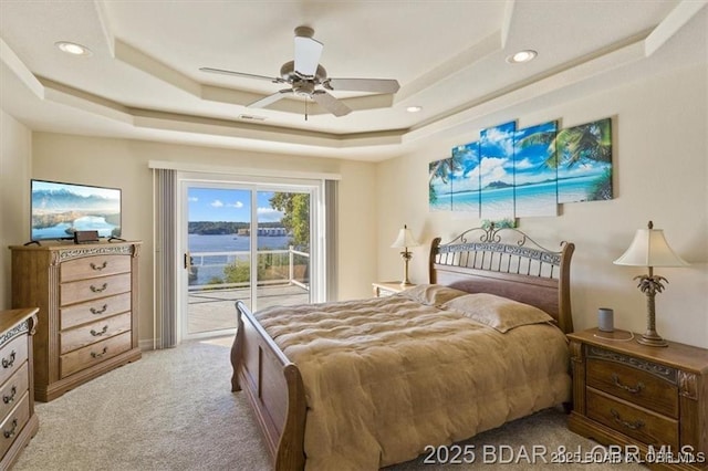 549 Cedar Rd, Lake Ozark, MO 65049 - bedroom featuring access to outside, a raised ceiling, light carpet, recessed lighting, and ceiling fan
