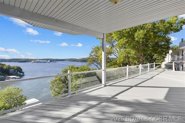 549 Cedar Rd, Lake Ozark, MO 65049 - wooden terrace featuring a water view