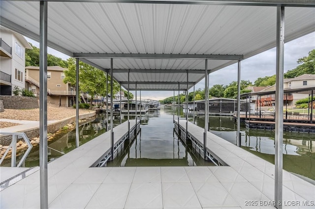80 Ledgestone Estates Ct, Sunrise Beach, MO 65079 - dock with a water view and boat lift
