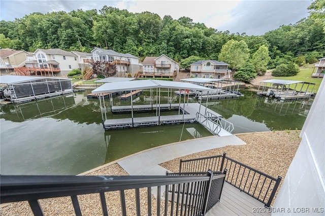 80 Ledgestone Estates Ct, Sunrise Beach, MO 65079 - dock area with a water view, boat lift, and a residential view