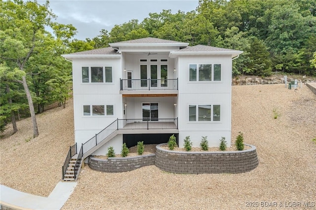 80 Ledgestone Estates Ct, Sunrise Beach, MO 65079 - rear view of house with a balcony, ceiling fan, a shingled roof, french doors, and stairway