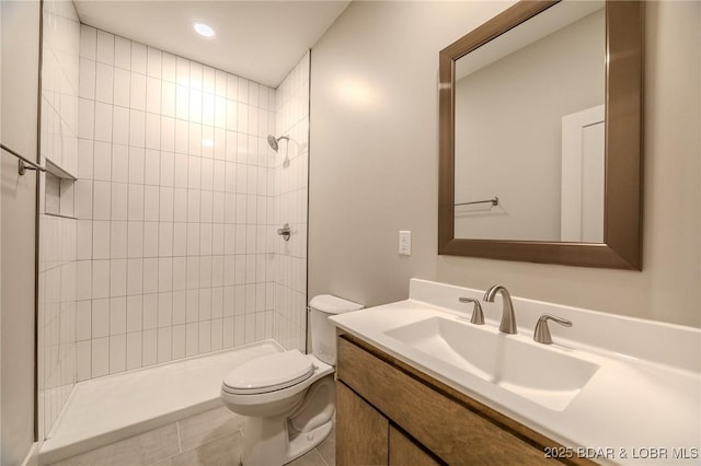 80 Ledgestone Estates Ct, Sunrise Beach, MO 65079 - full bath featuring a tile shower, vanity, and tile patterned flooring