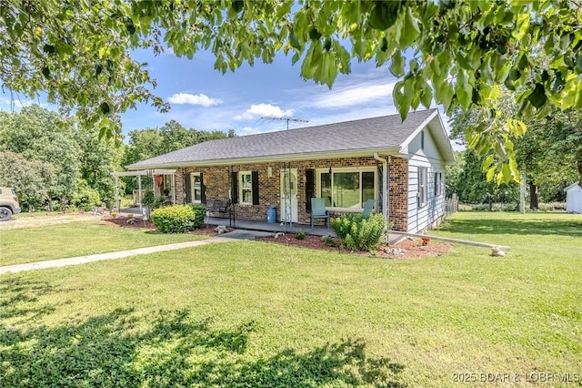 15852 Kindling Rd, Eldridge, MO 65463 - ranch-style house featuring brick siding, a front lawn, and a porch