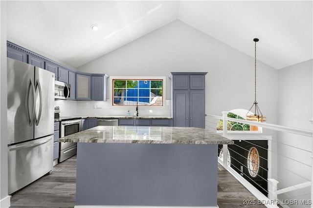 64 Oriole Ct, Lake Ozark, MO 65049 - kitchen featuring stainless steel appliances, dark wood-style floors, gray cabinetry, light stone counters, and backsplash