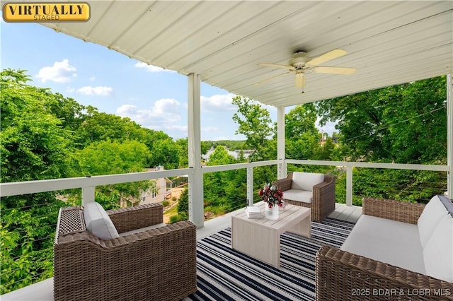 64 Oriole Ct, Lake Ozark, MO 65049 - deck featuring ceiling fan and an outdoor hangout area