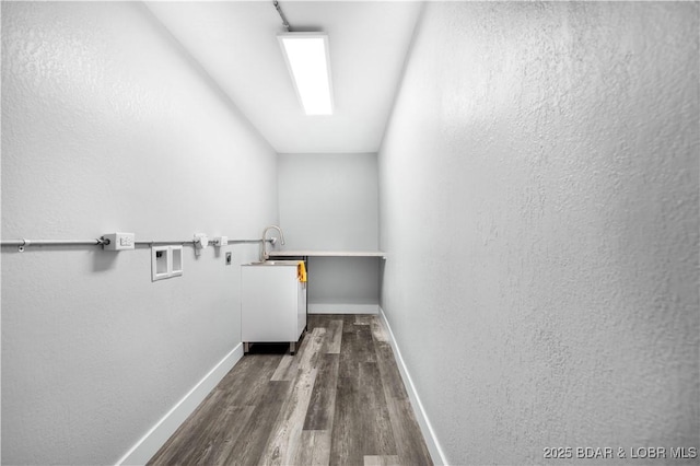 64 Oriole Ct, Lake Ozark, MO 65049 - washroom featuring hookup for a washing machine, dark wood-style flooring, and baseboards
