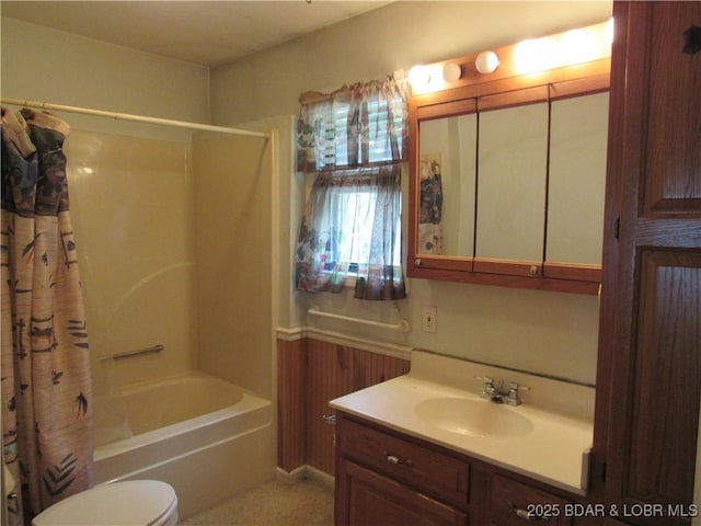 full bath featuring vanity, toilet, and shower / bath combination with curtain