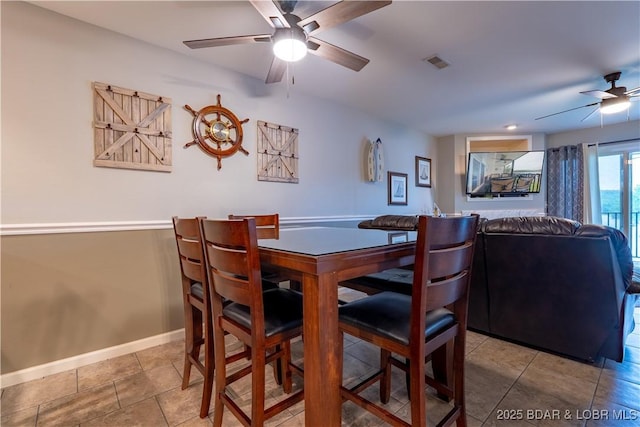 549 Park Place Dr Unit 2D, Kaiser, MO 65047 - tiled dining space featuring a ceiling fan and baseboards
