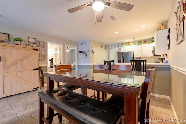 549 Park Place Dr Unit 2D, Kaiser, MO 65047 - dining space featuring a ceiling fan, light tile patterned floors, baseboards, and recessed lighting