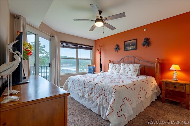 549 Park Place Dr Unit 2D, Kaiser, MO 65047 - carpeted bedroom featuring access to outside and ceiling fan