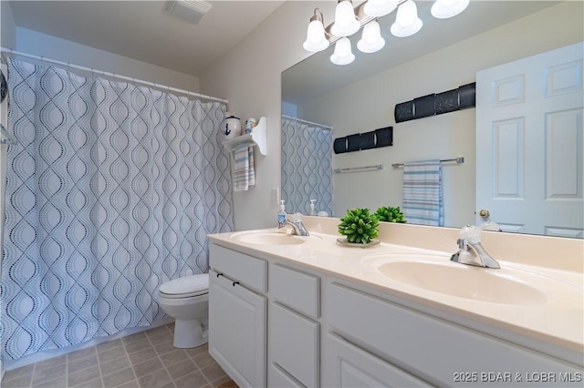 549 Park Place Dr Unit 2D, Kaiser, MO 65047 - bathroom featuring toilet, double vanity, a chandelier, tile patterned floors, and a shower with curtain